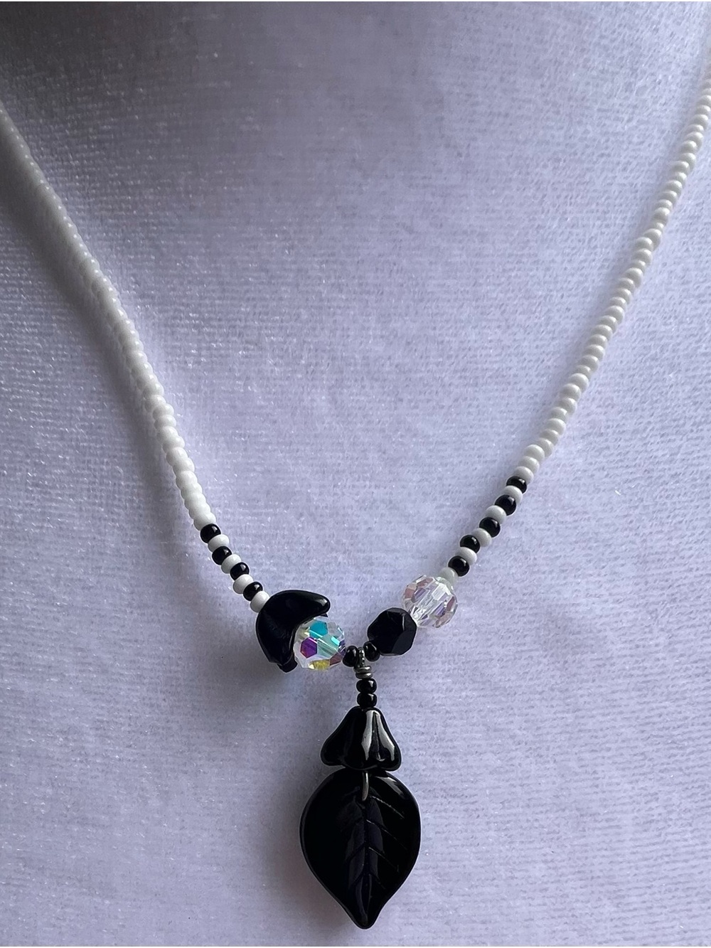 Black Leaf Pendant Beaded Necklace with Iridescent Accents